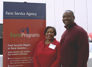 Alabama FSA Outreach Coordinator Vickie Lane (left) meets with Victor Harris (right), publisher of Minority Landowner Magazine, at FSA’s exhibit.