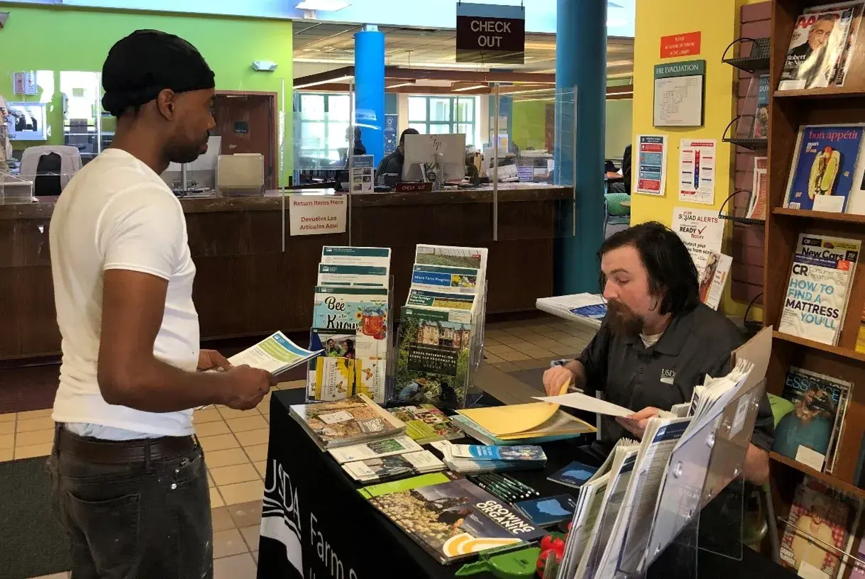 Two people in a library
