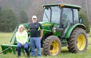 Barry and his wife, Lisa, at their family farm, Cattail Creek Farms. Photo courtesy of Barry Warner.